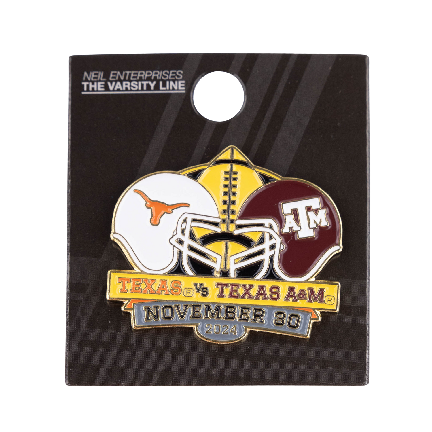 Lapel pin of Texas vs Texas A&M with both teams' helmets.