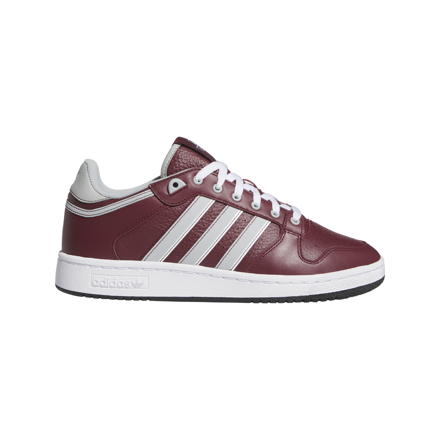 Adidas sneaker with maroon leather and white Adidas stripes.