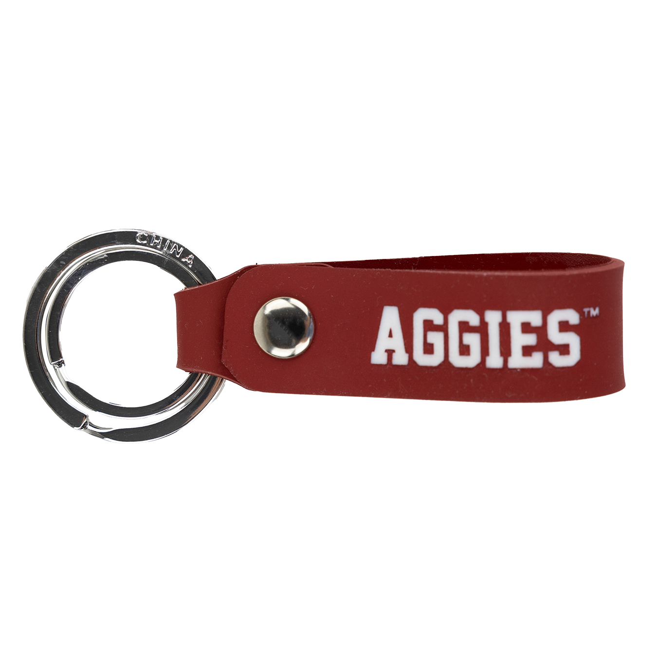 Silver keychain with maroon strap and white aggies text