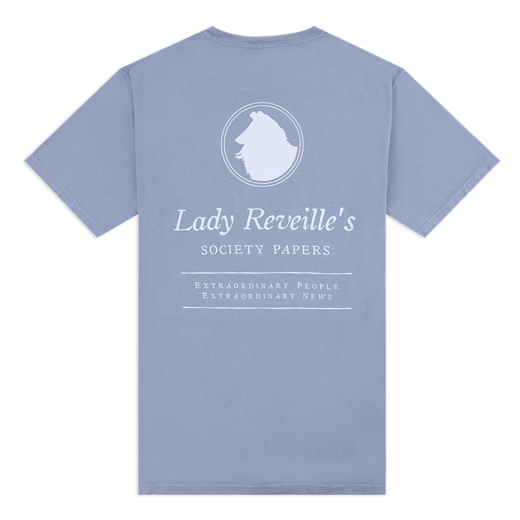 Blueish grey t-shirt with white writing on the back. White outline of Reveille with "Lady reveille's Society Papers" written below. 