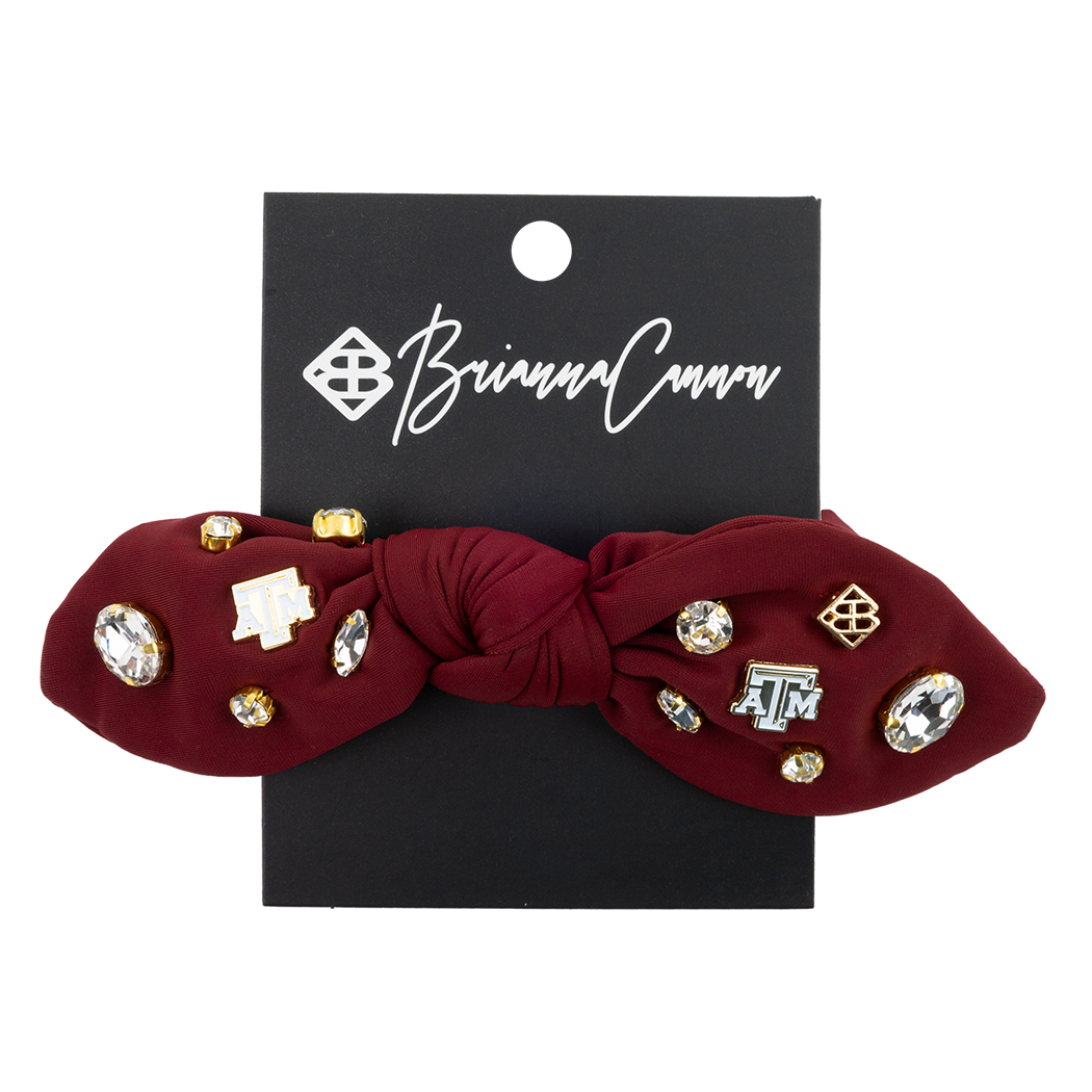 Maroon bow scrunchie with ATM charms.