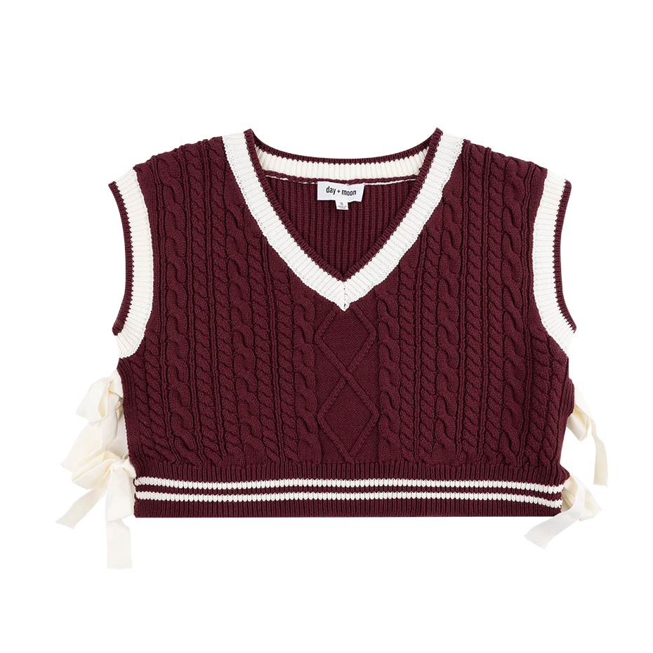 Maroon crop sweater with white trim and white bows on the sides