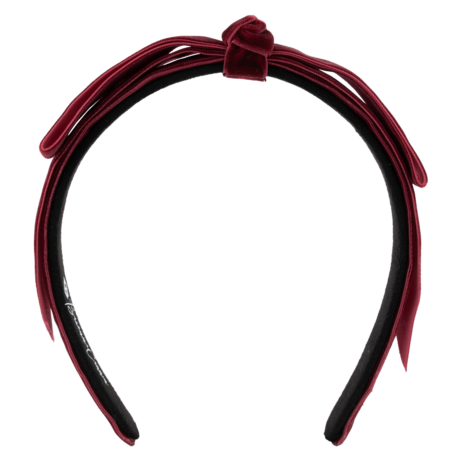 A maroon velvet headband with a bow on the top 