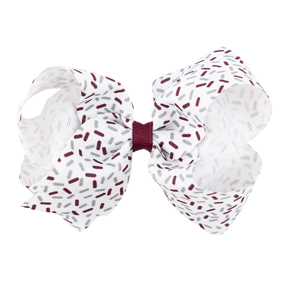 White bow with maroon and grey confetti