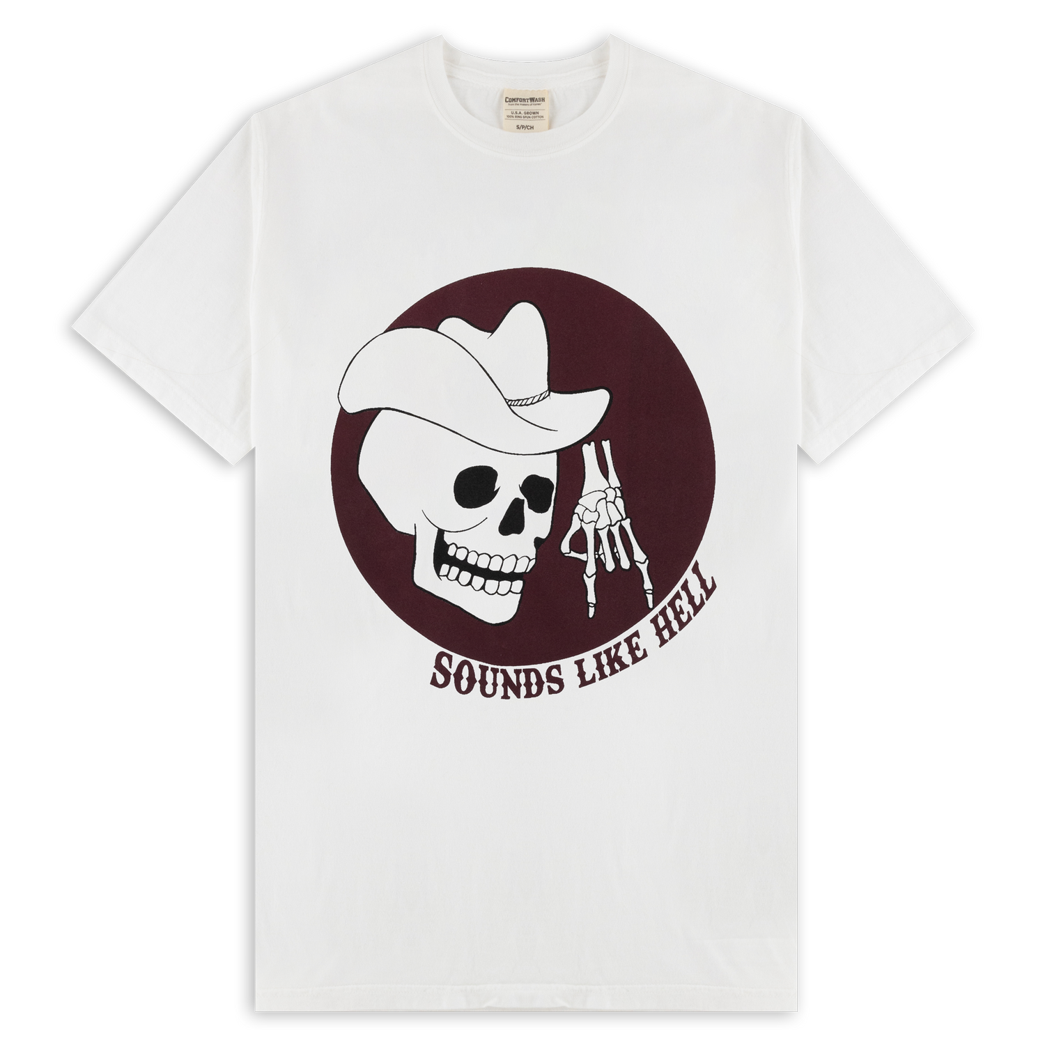 A white tshirt. There is a maroon circle on the front of the shirt with a white skeleton head wearing a cowboy hat doing the 'horns down' hand sign. Below the maroon circle is 'sounds like hell' written in maroon block letters. 