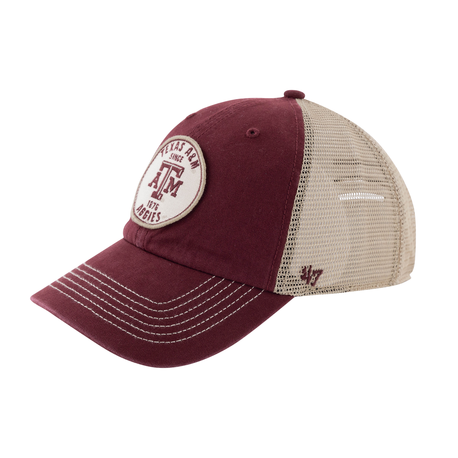 Maroon hat with cream mesh backing. Circular patch with "TEXAS A&M AGGIES" in maroon with a maroon ATM logo.