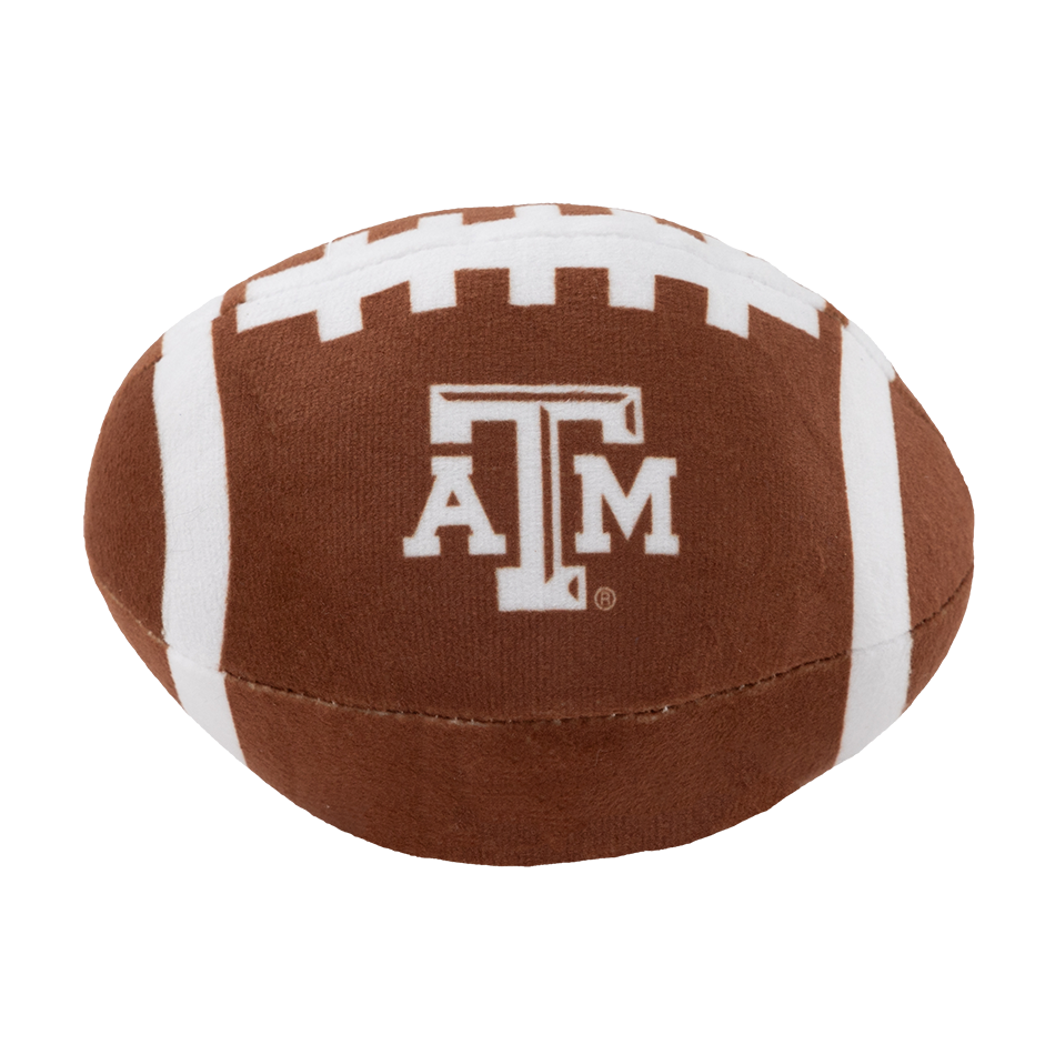 A Dog Football Toy withe White Texas A&M Logo