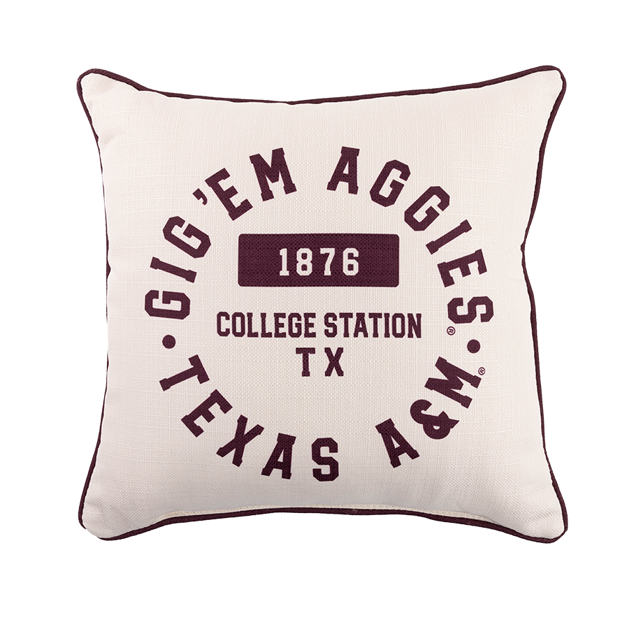 Ivory pillow with "Texas A&M Gig 'Em Aggies" in maroon