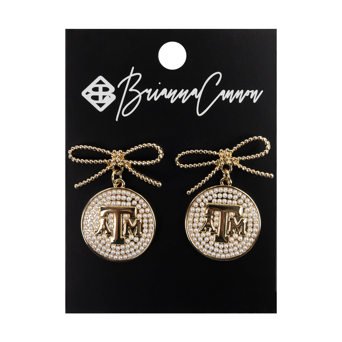 Gold and pearl medallion ATM earrings with bows.