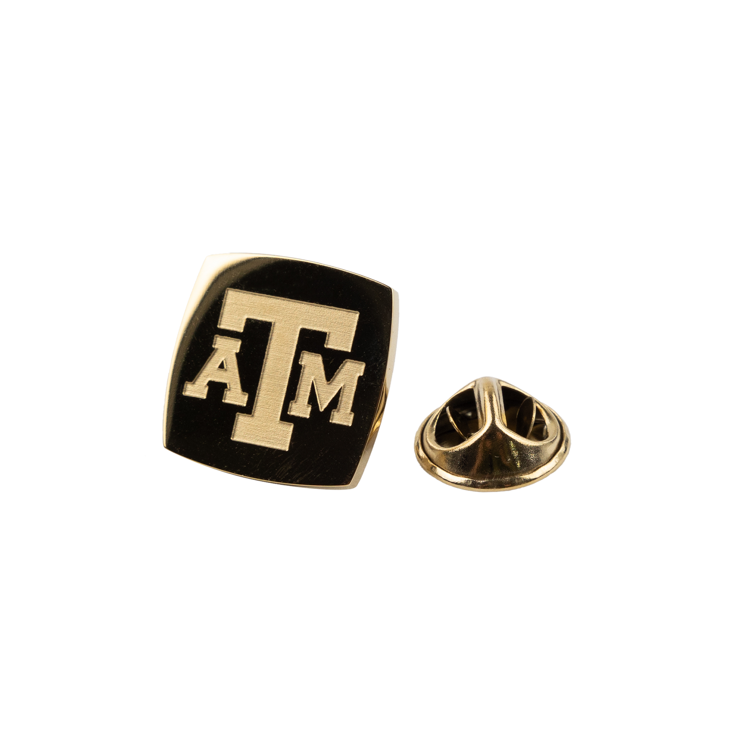 A gold square pin with A&M printed in gold block lettering. 