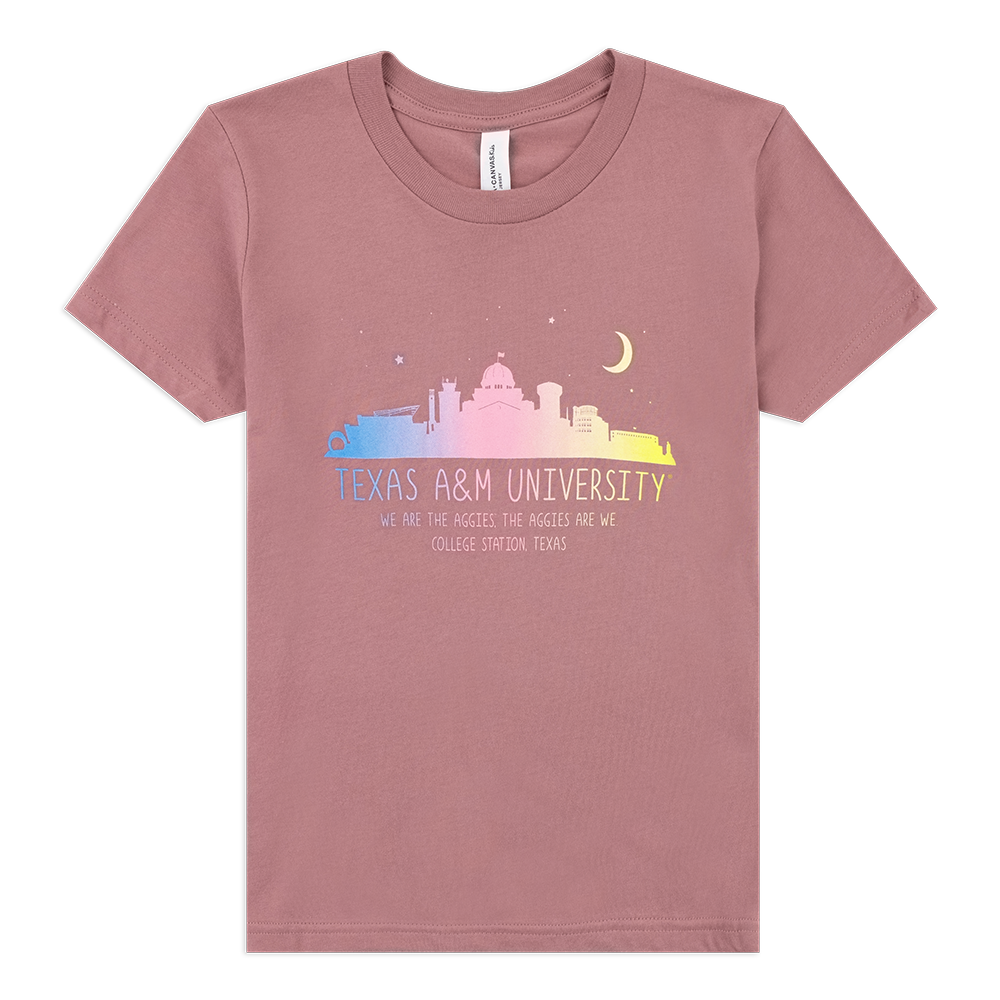 Mauve tshirt with a rainbow print of the night view of the A&M skyline. Below the skyline is "TEXAS A&M UNIVERSITY" also in a rainbow color.  