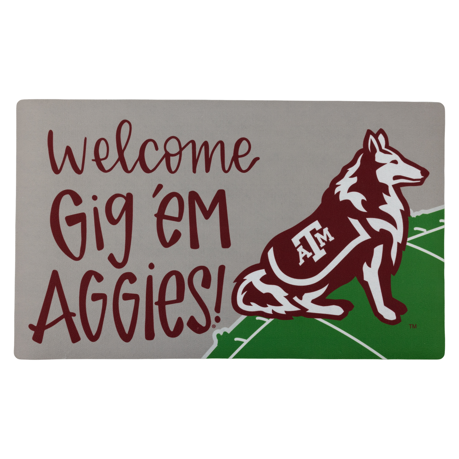 A A&M themed doormat. The text is written in maroon script letters and says "Welcome Gig 'em Aggies!" Next to the font is Reveille sitting on a football field.  